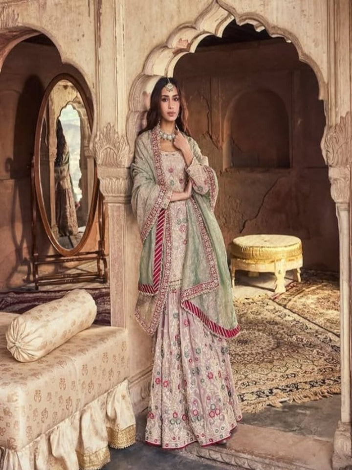 Neerus Pink georgette embellished kurta set with sharara and dupatta - front view