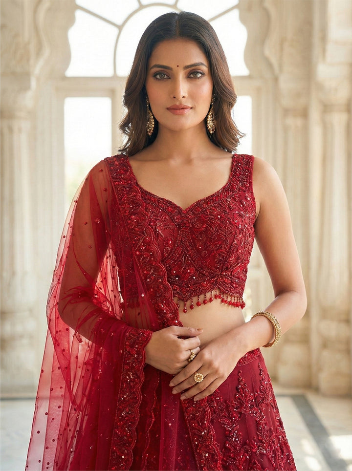 Neerus Red tissue hand embroidered lehenga set - side view