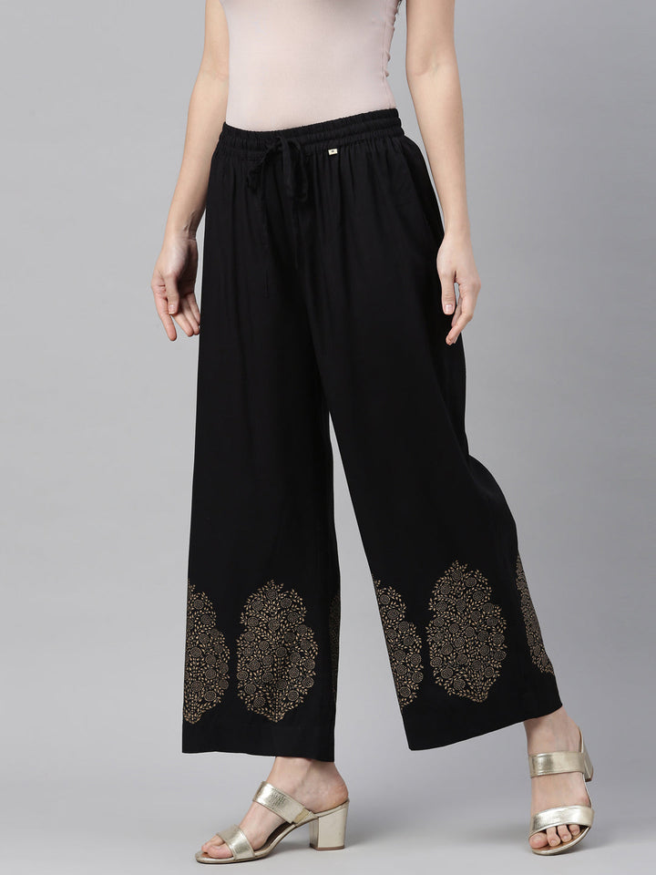 Neerus Black polyester solid palazzo bottom - back view