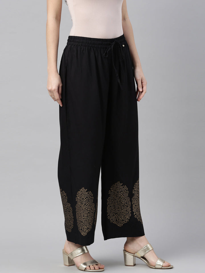 Neerus Black polyester solid palazzo bottom - side view