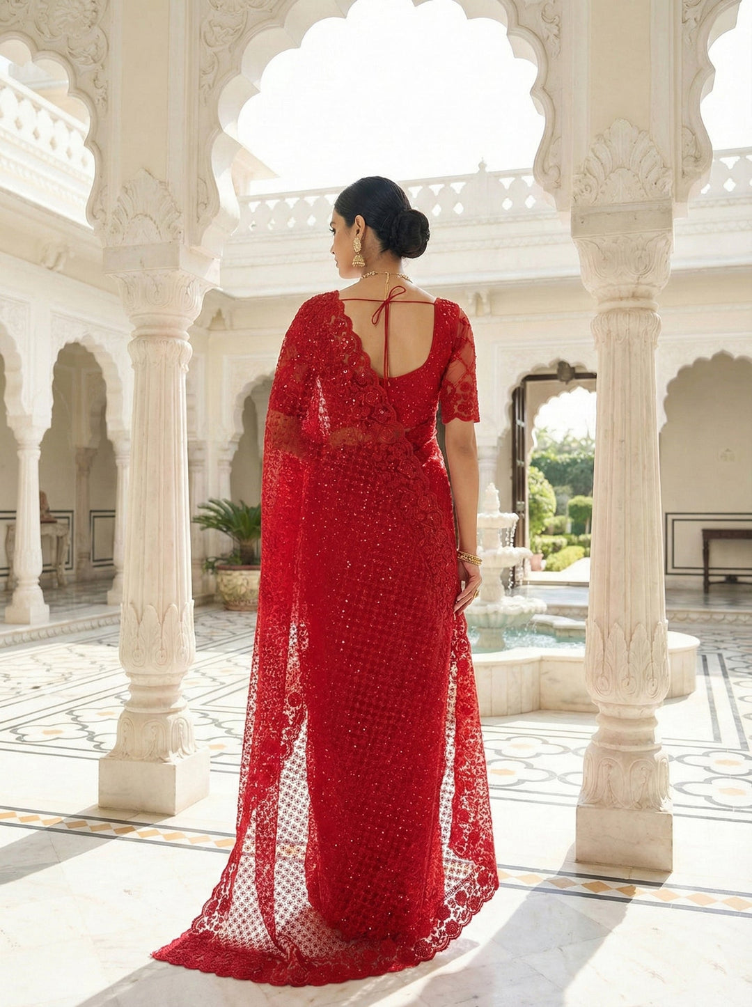 Neerus Red net hand embroidered saree - side view