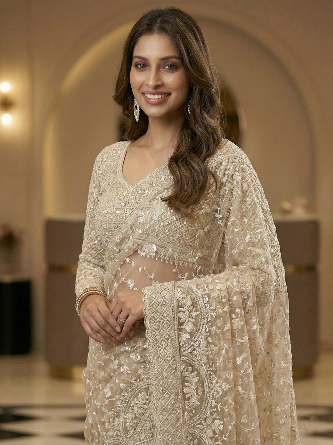 Neerus White net hand embroidered saree - back view