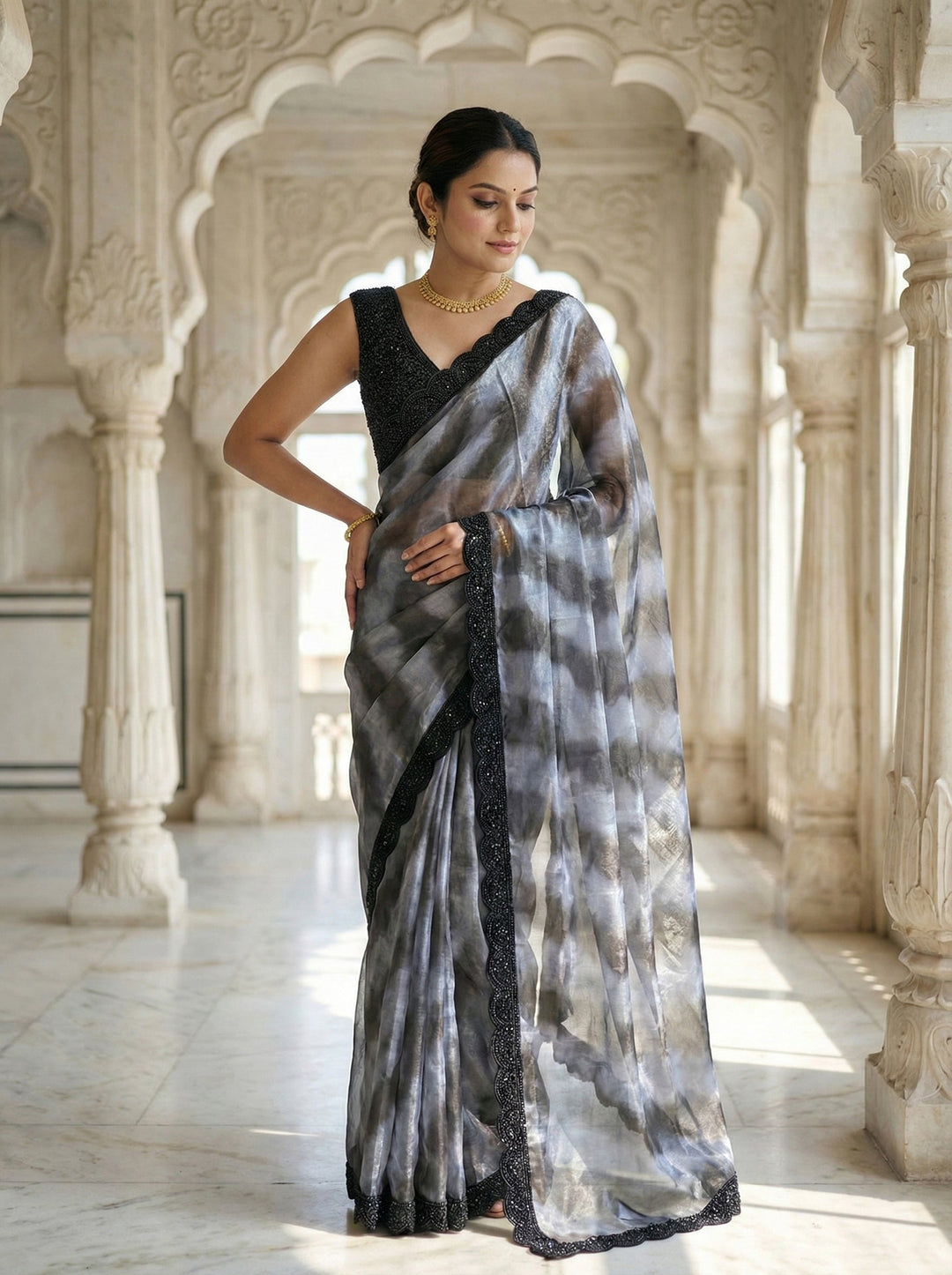 Neerus Blue silk embellished saree with readymade blouse - side view