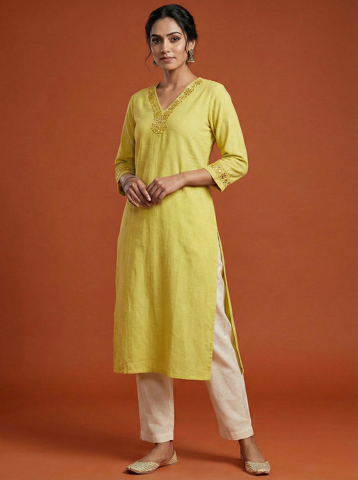 Neerus Yellow rayon solid kurti - front view