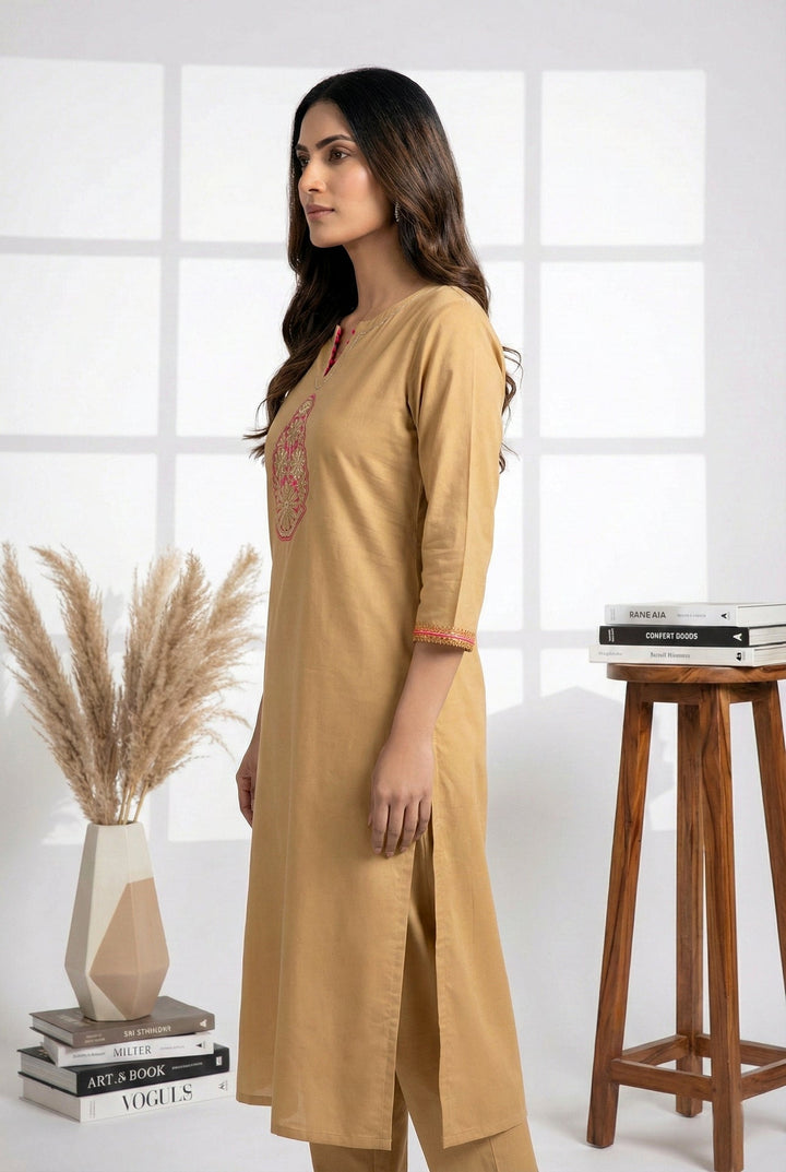 Neerus Beige muslin hand embroidered kurti - back view