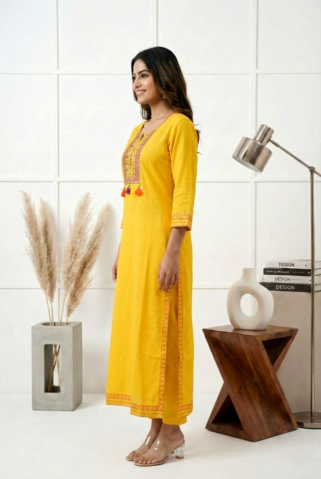 Neerus Yellow muslin hand embroidered kurta - back view
