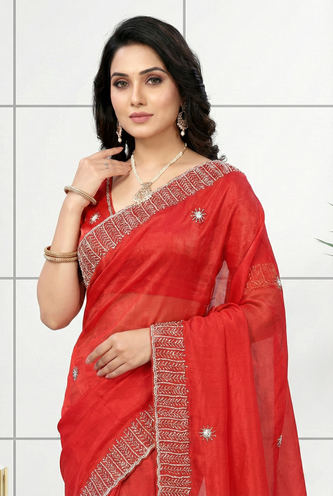 Neerus Red silk embellished saree with stone embroidery - back view