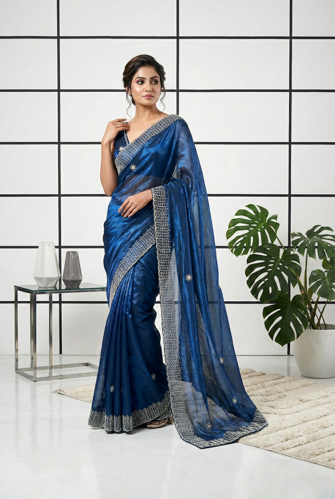 Neerus Blue organza embellished saree with peacock stone motif - front view