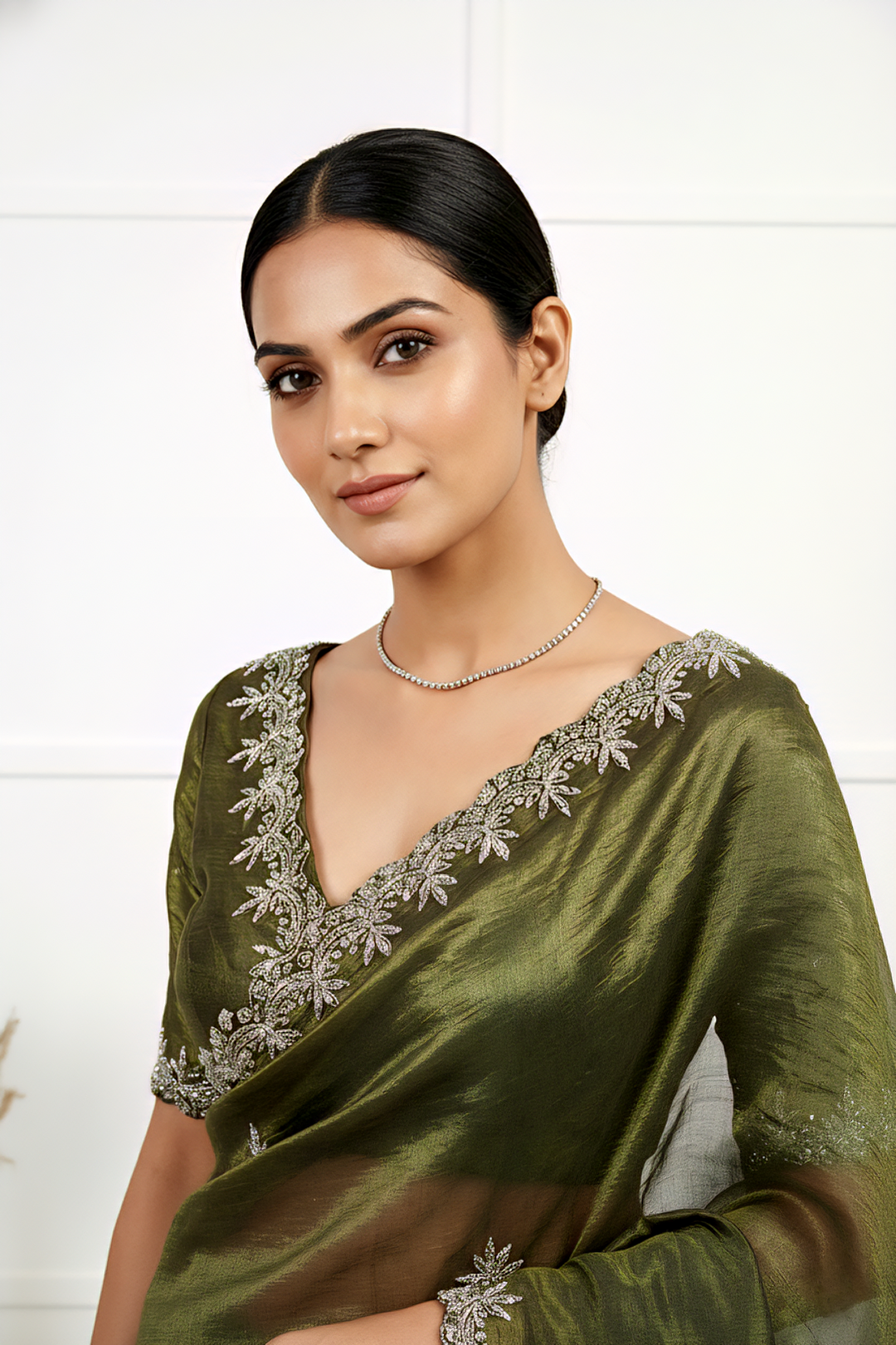 Neerus Green organza hand embroidered saree - back view