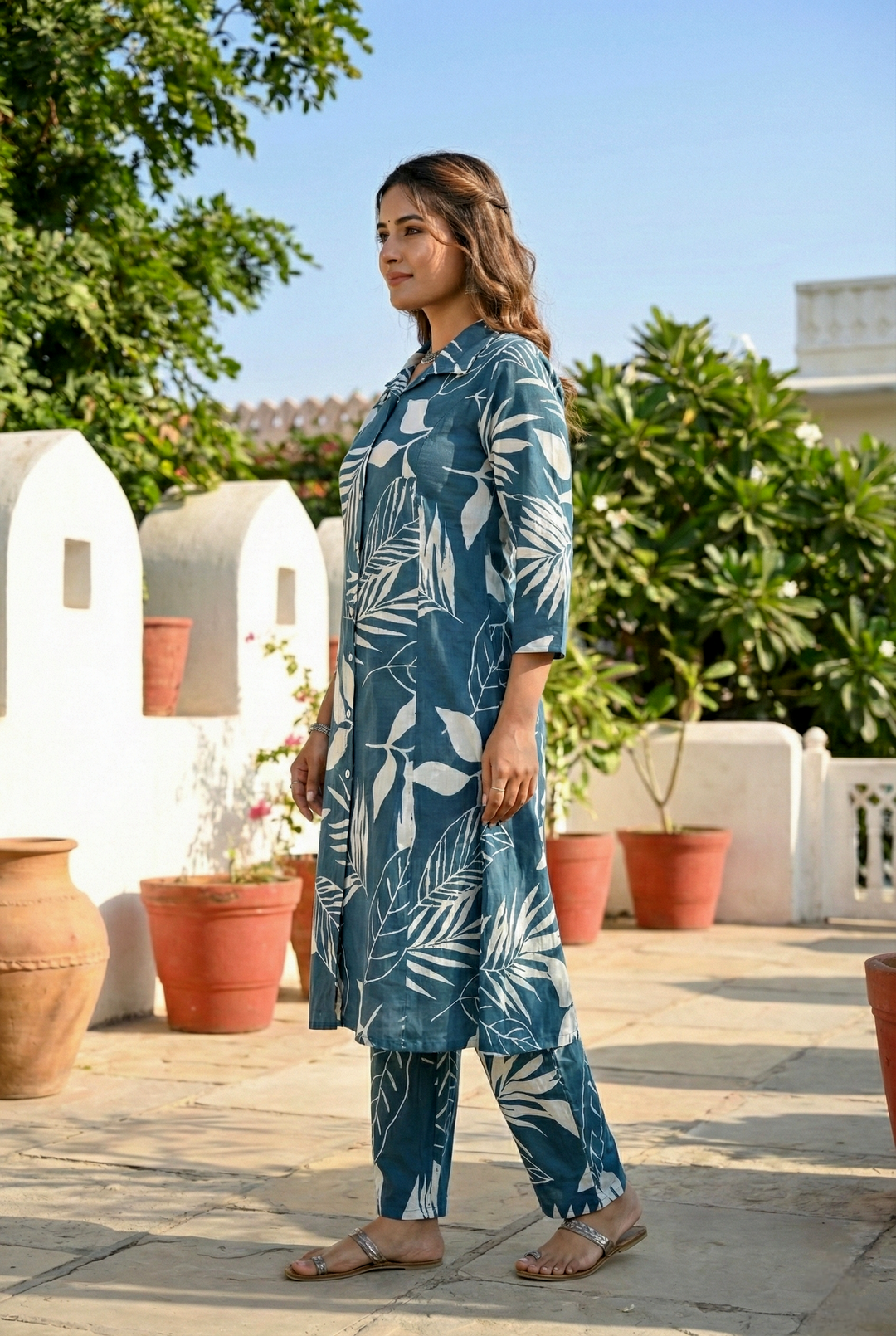 Neerus Green cotton printed kurta set - back view
