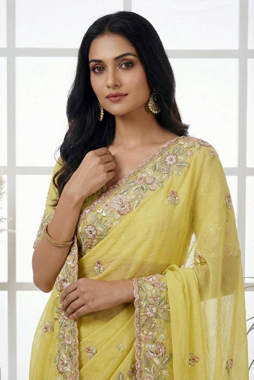 Neerus Yellow Georgette Hand Embroidered Saree - side view