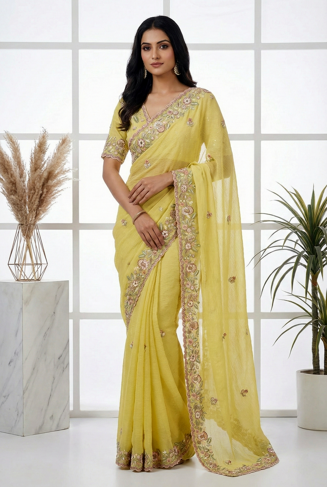 Neerus Yellow Georgette Hand Embroidered Saree - front view