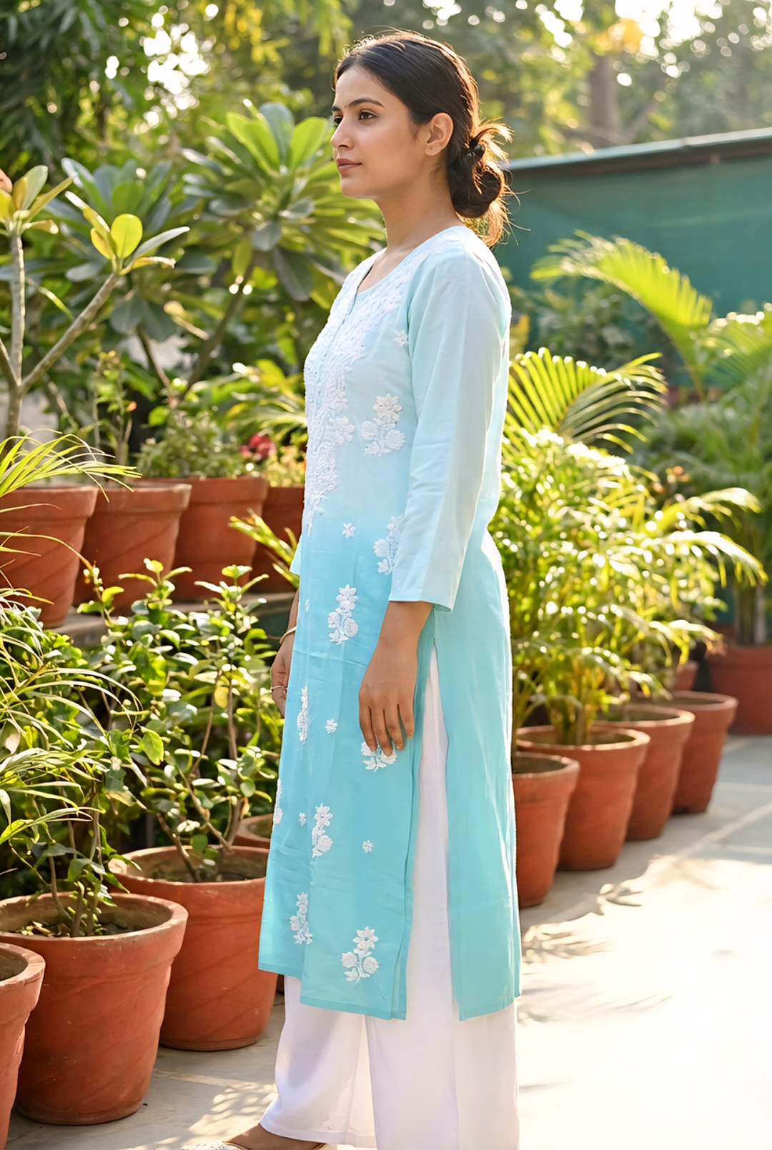Neerus Blue Rayon Hand Embroidered Kurti - side view