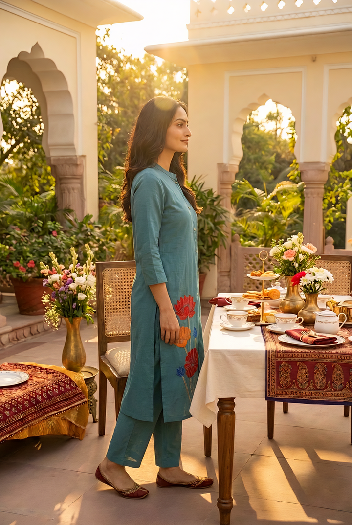 Neerus Green cotton hand embroidered kurta set - side view