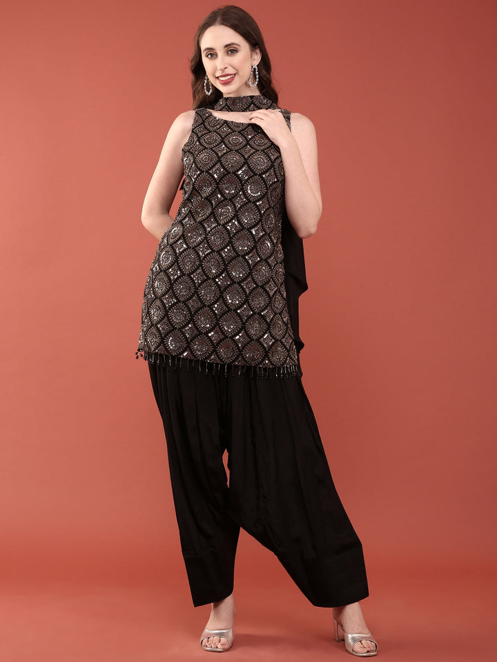 Neerus Black crepe embellished suit set with dhoti and dupatta - back view