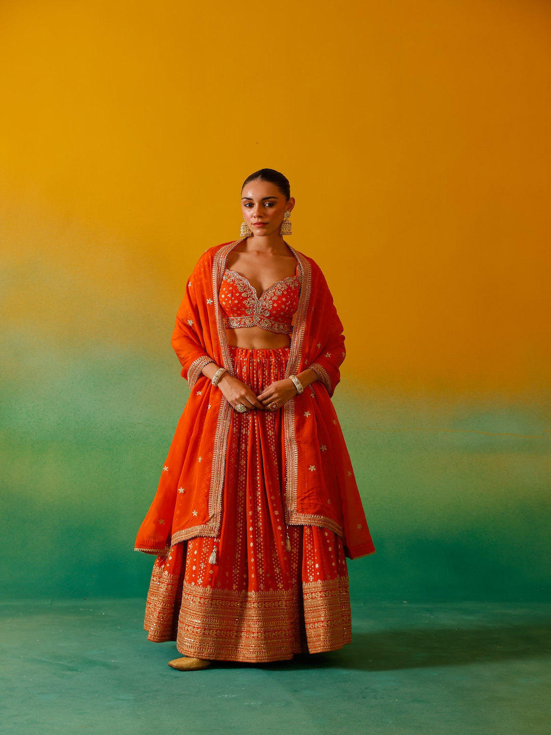 Neerus Orange Georgette Embroidered Lehenga Set - front view