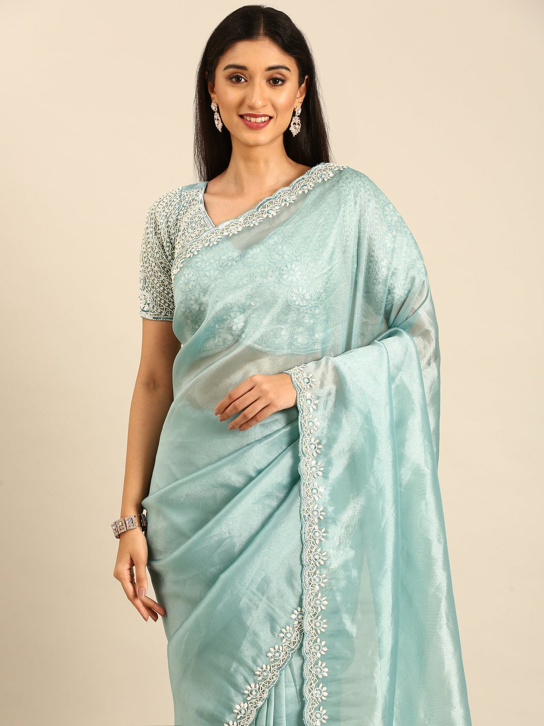 Neerus Blue tissue embellished saree with pearls and beads - side view