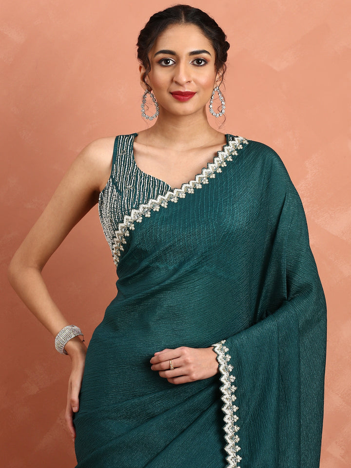 Neerus Green net embellished saree with pearl embroidery - side view