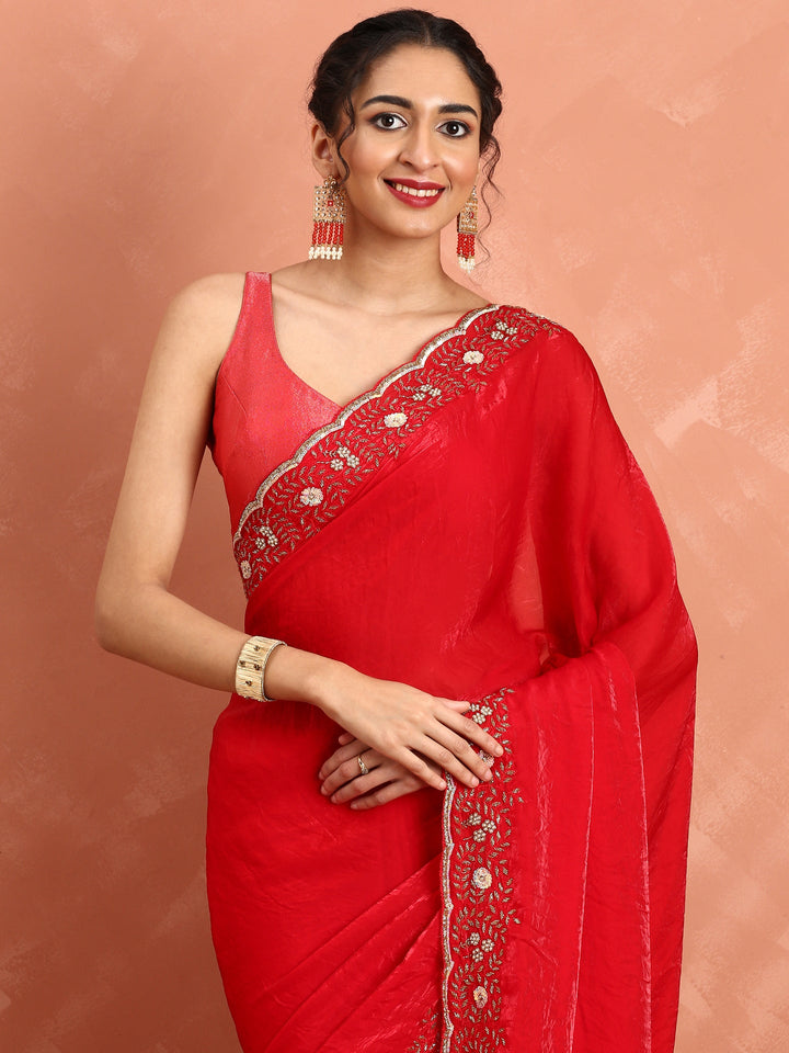 Neerus Red hand embroidered saree with Swarovski stones - side view