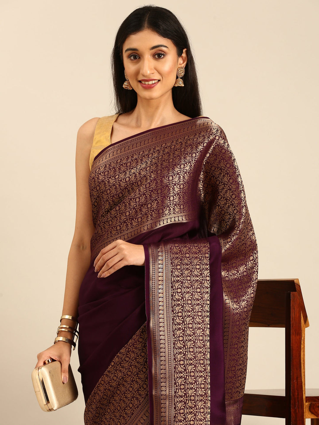 Neerus Maroon crepe woven saree with zari jaal border - side view