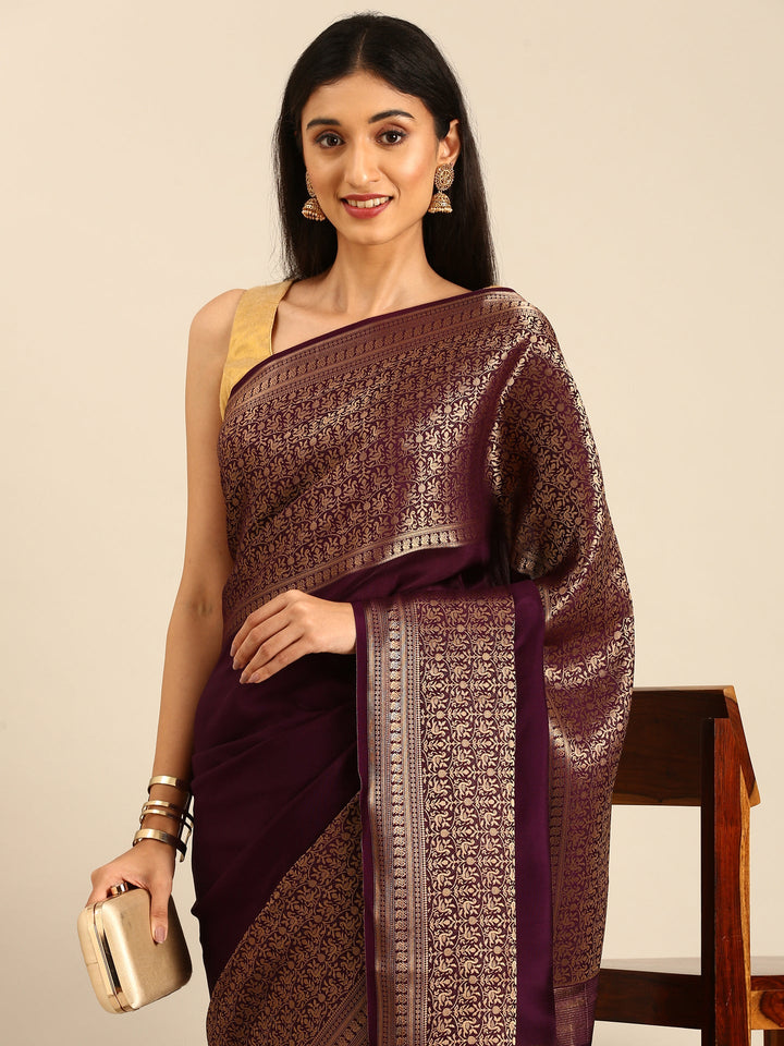 Neerus Maroon crepe woven saree with zari jaal border - side view