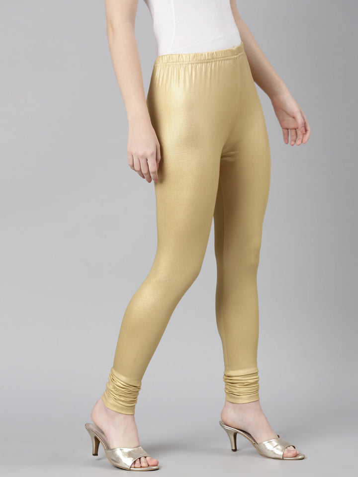 Neerus Gold shimmer solid legging bottom - side view