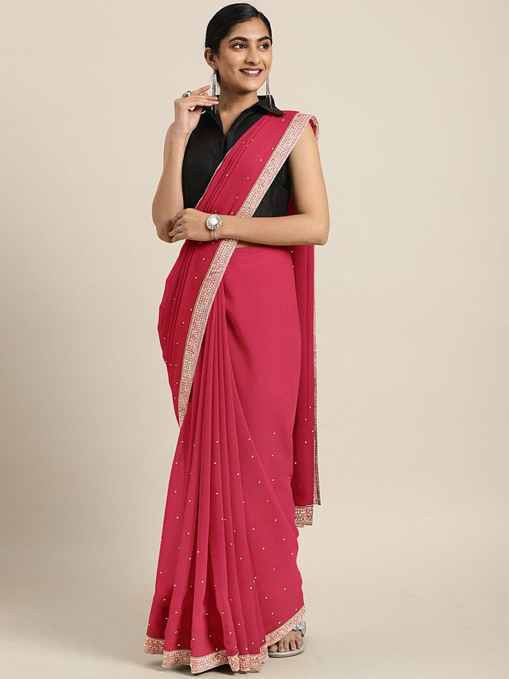 Neerus Pink georgette embellished saree - front view