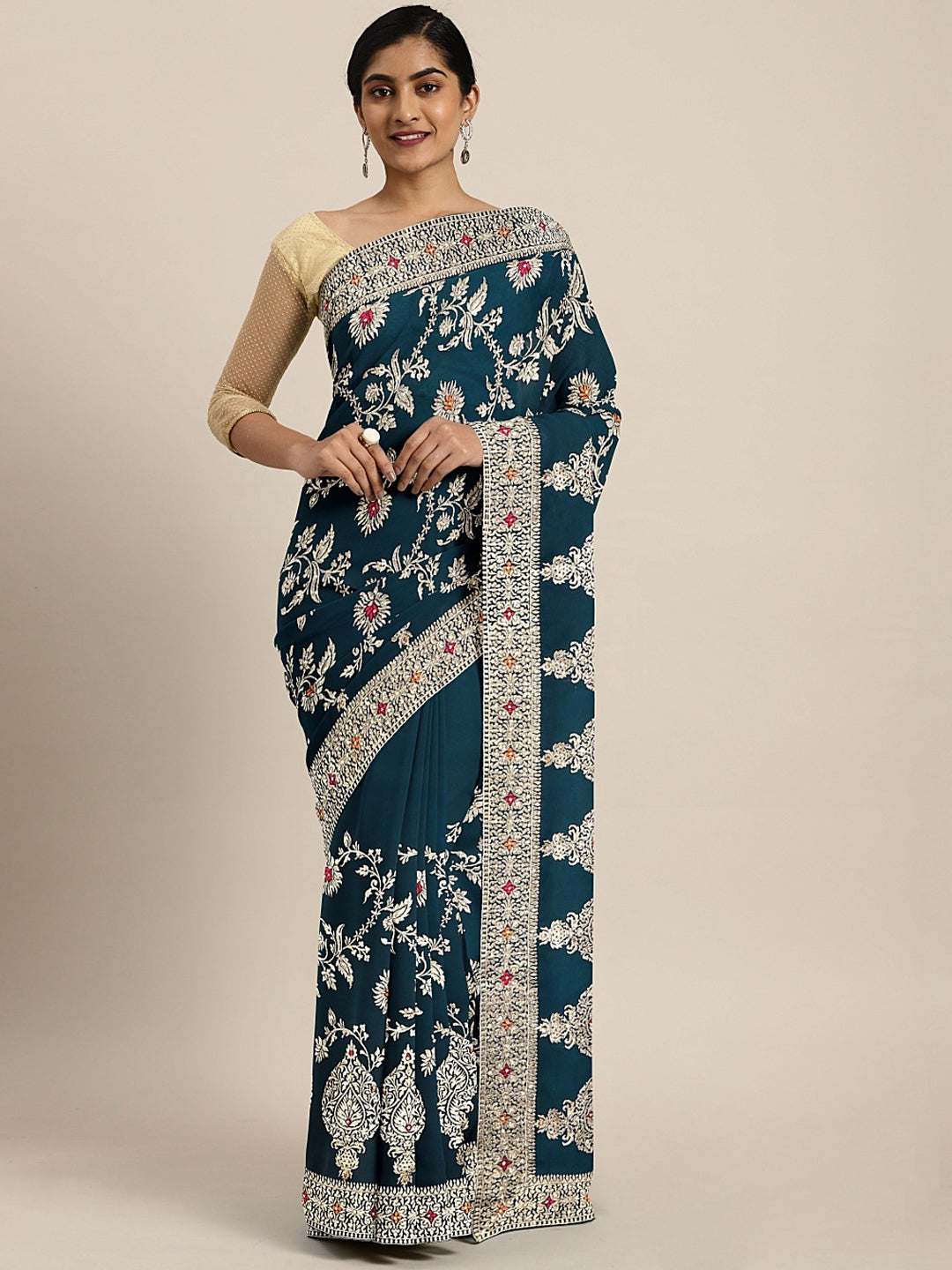 Neerus Green georgette textured saree with blouse - front view