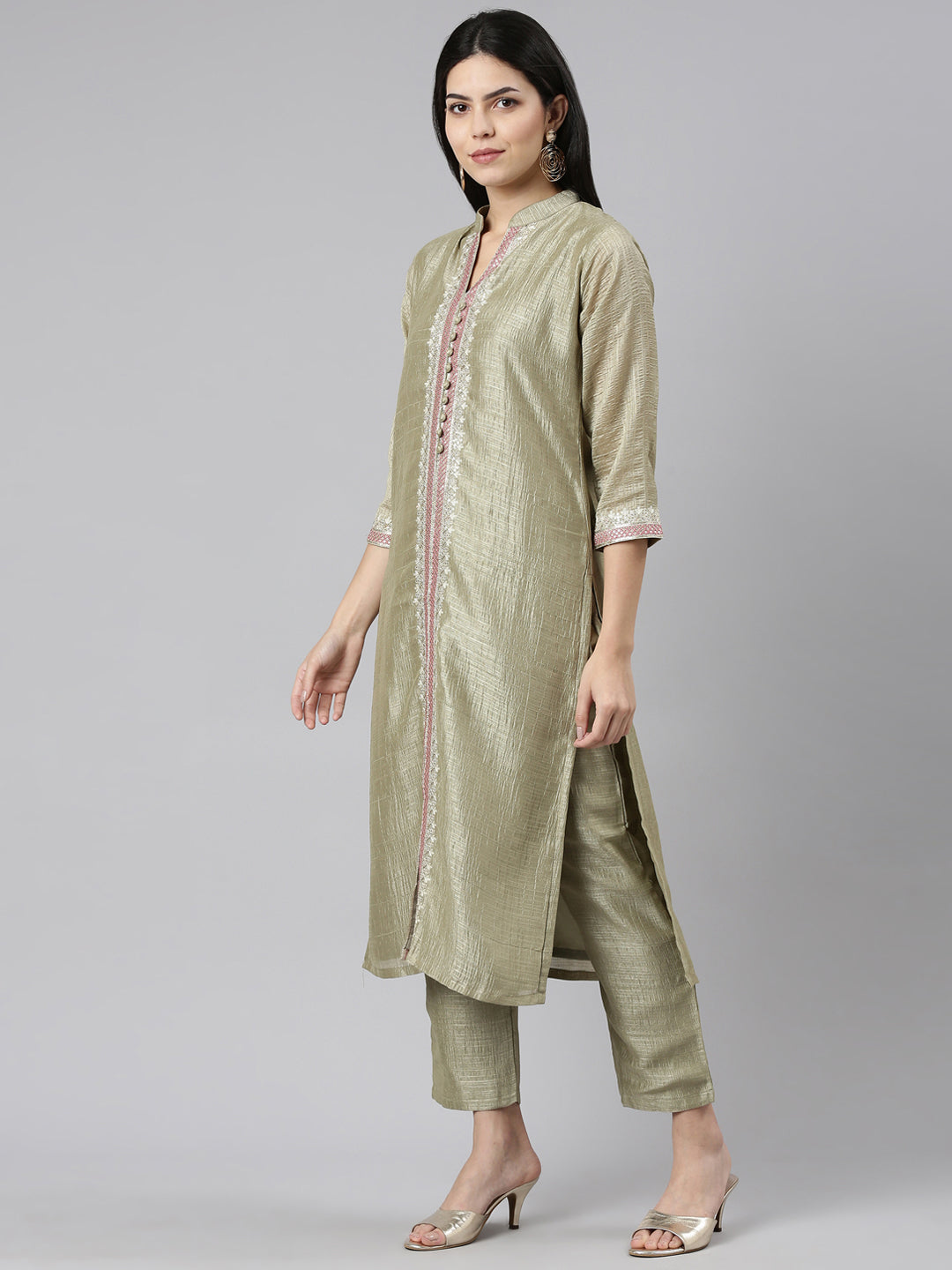 Neerus Green raw silk solid kurta set with trousers - back view