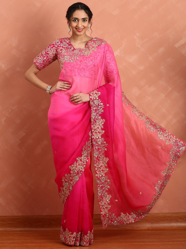Rani pink pure organza saree with heavy blouse with pearl and cut dana embroidery