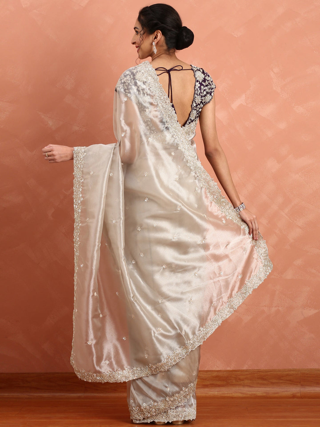 Neerus Grey tissue embroidered saree with zari work - back view