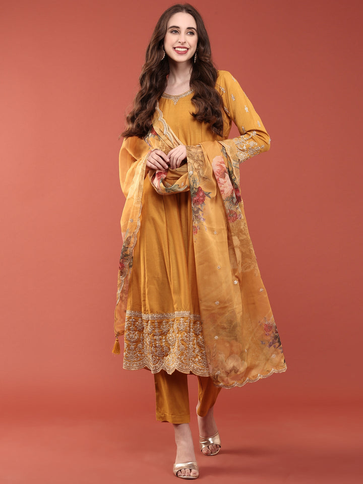 Neerus Yellow silk embroidered anarkali suit set - front view