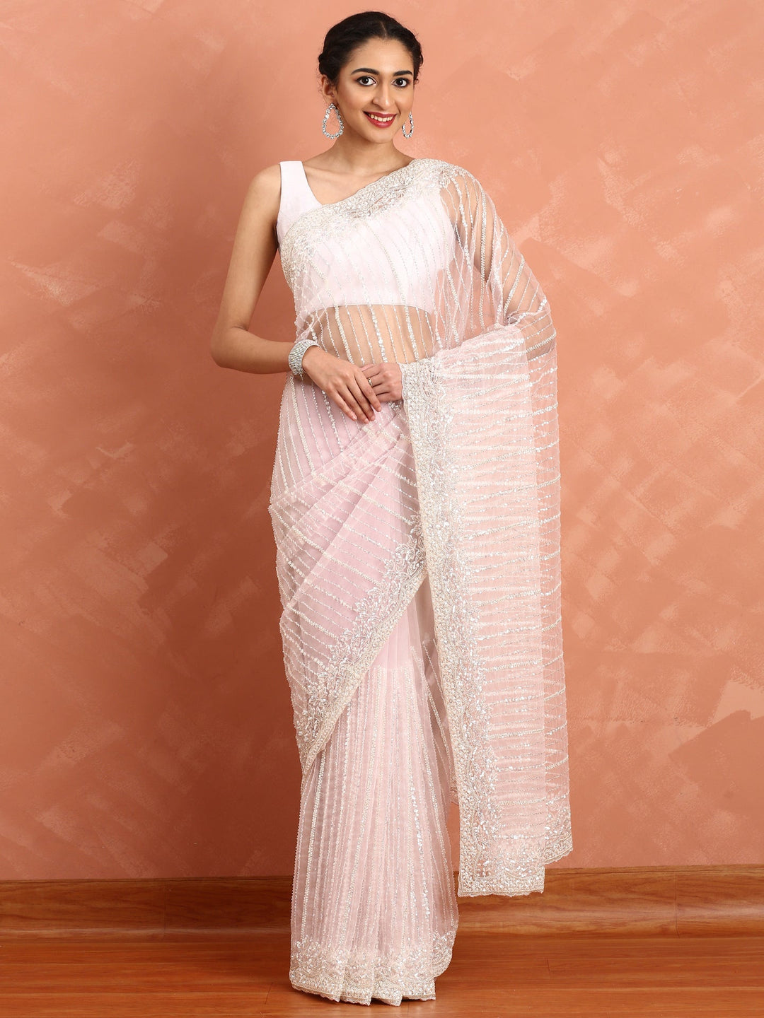 Neerus Pink net hand embroidered saree - front view