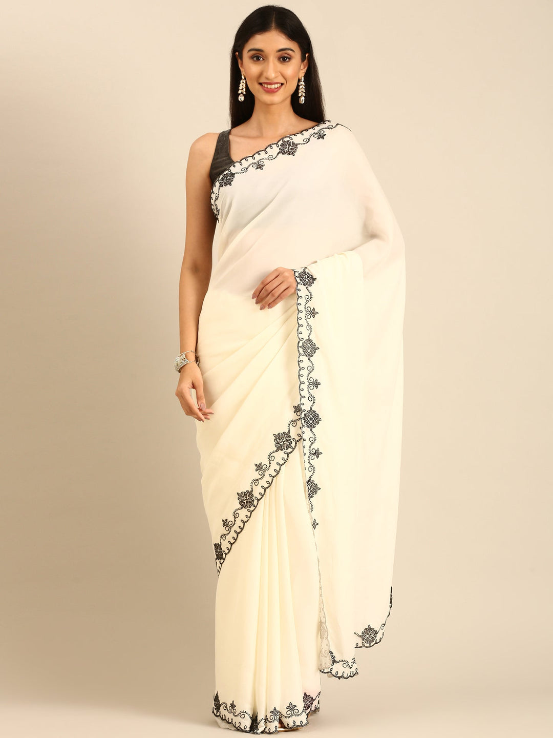 Neerus Beige satin embellished saree with Swarovski border - front view