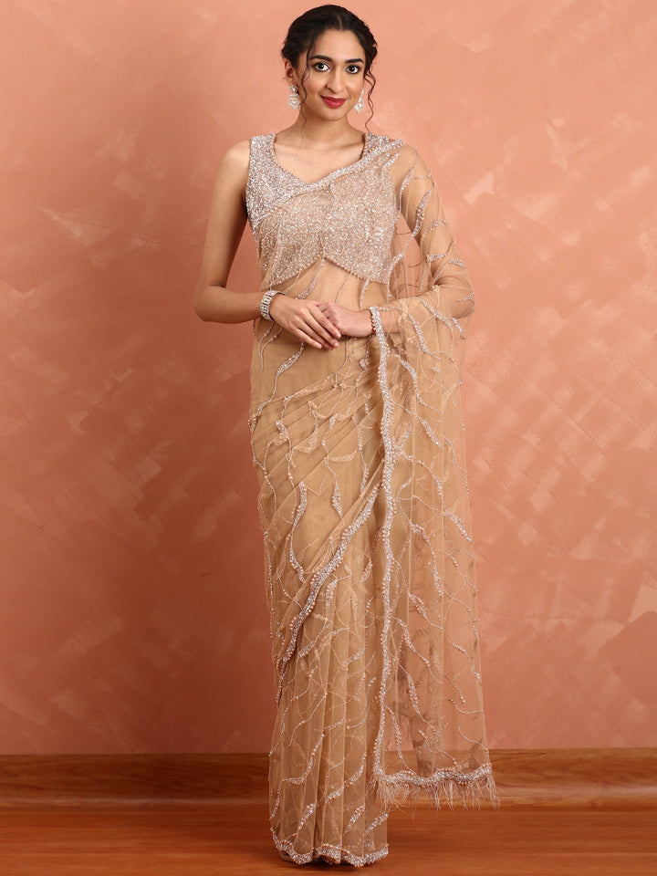 Neerus Pink net hand embroidered saree with Swarovski blouse - front view