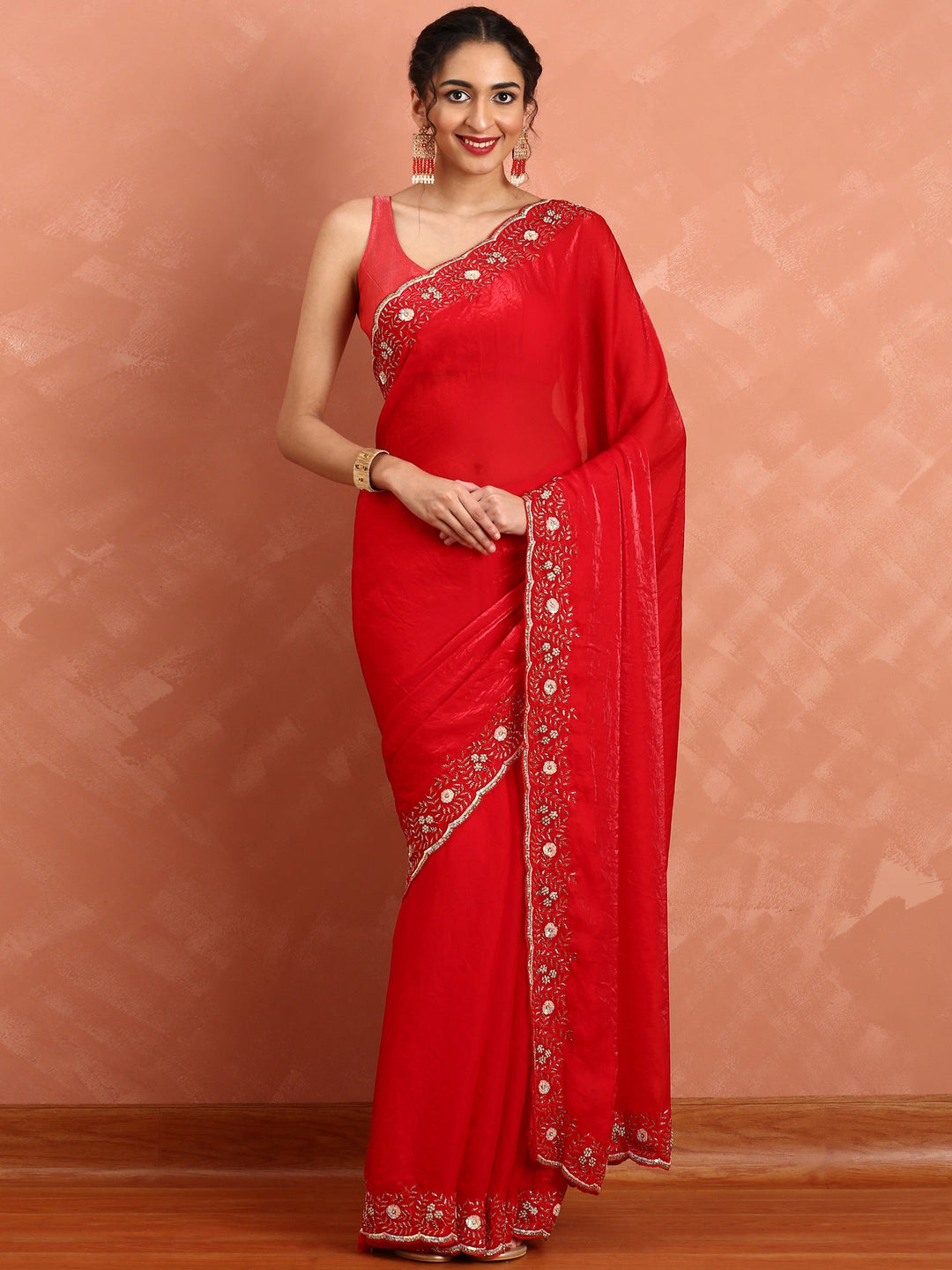 Neerus Red hand embroidered saree with Swarovski stones - front view