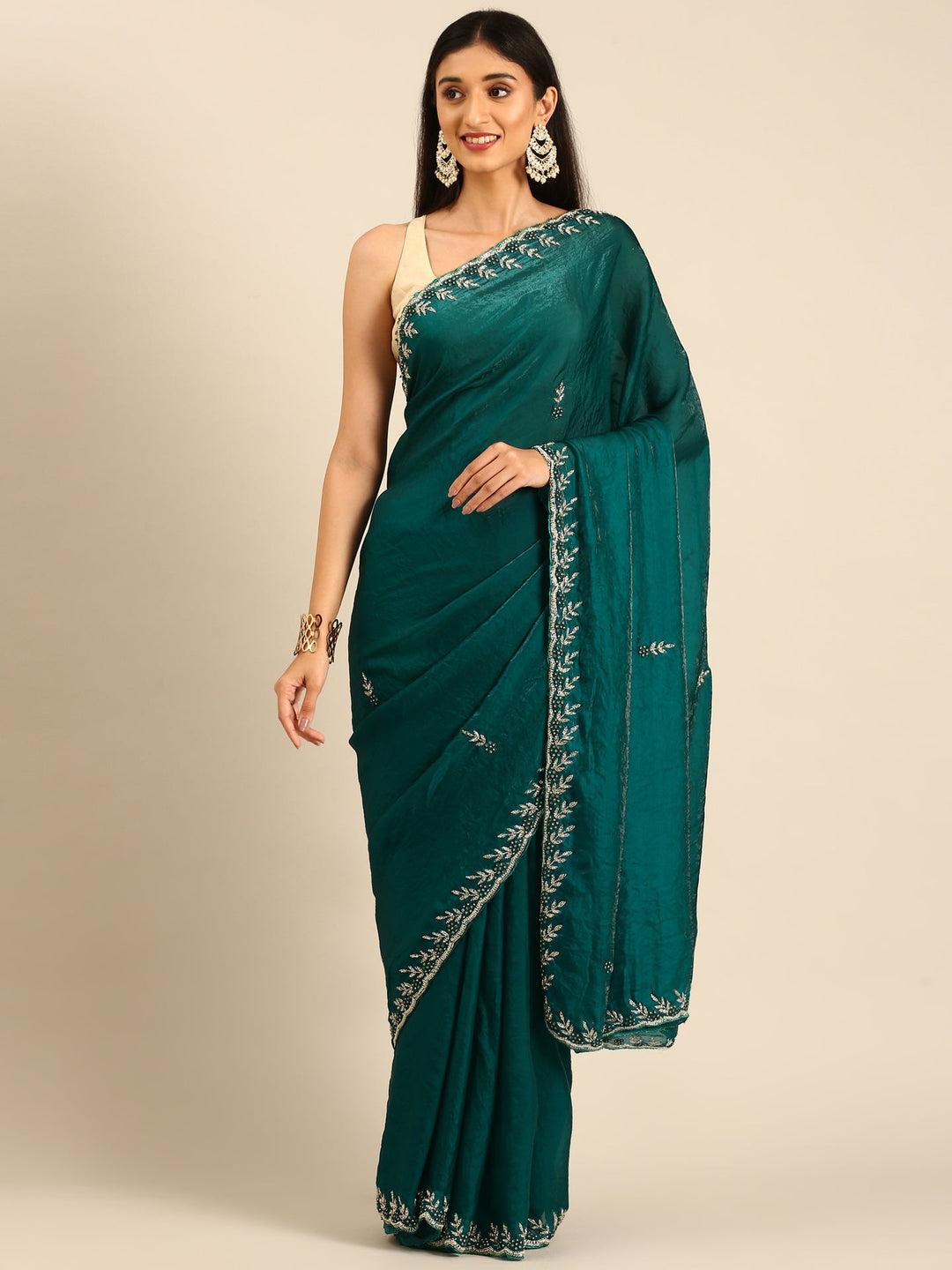 Neerus Green tissue embellished saree - front view