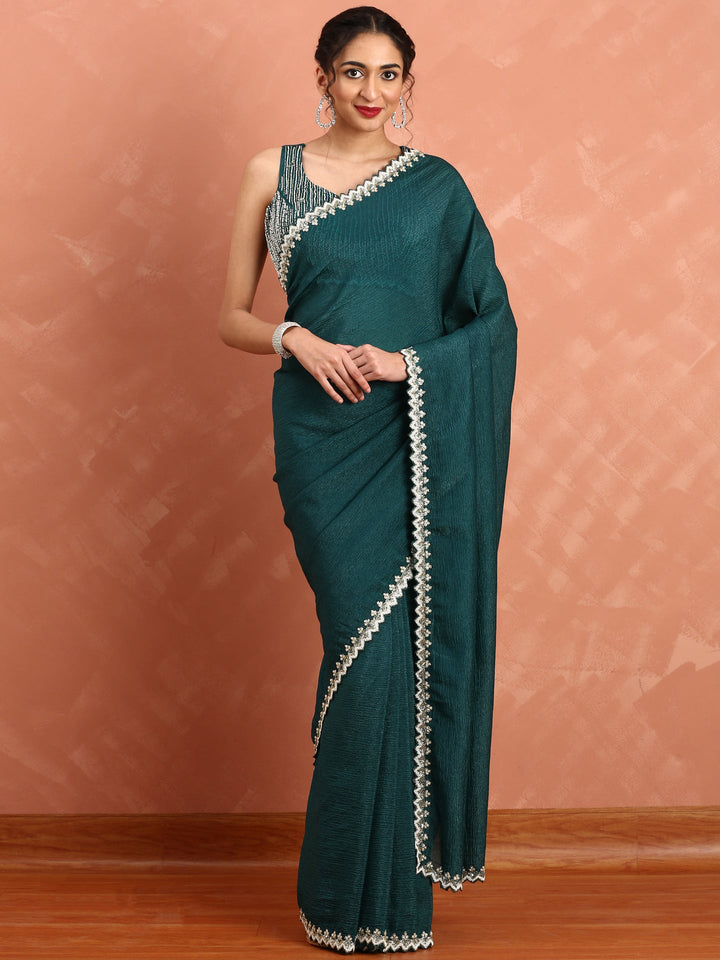 Neerus Green net embellished saree with pearl embroidery - front view