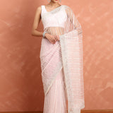 Baby pink net saree with cut Dana hand embroidery
