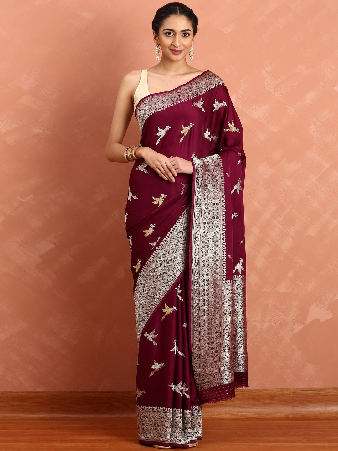 Neerus Maroon Banarasi woven saree with gold silver motifs - back view
