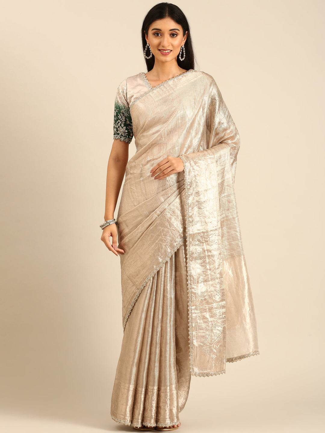 Neerus Grey tissue woven saree with green contrast blouse - front view