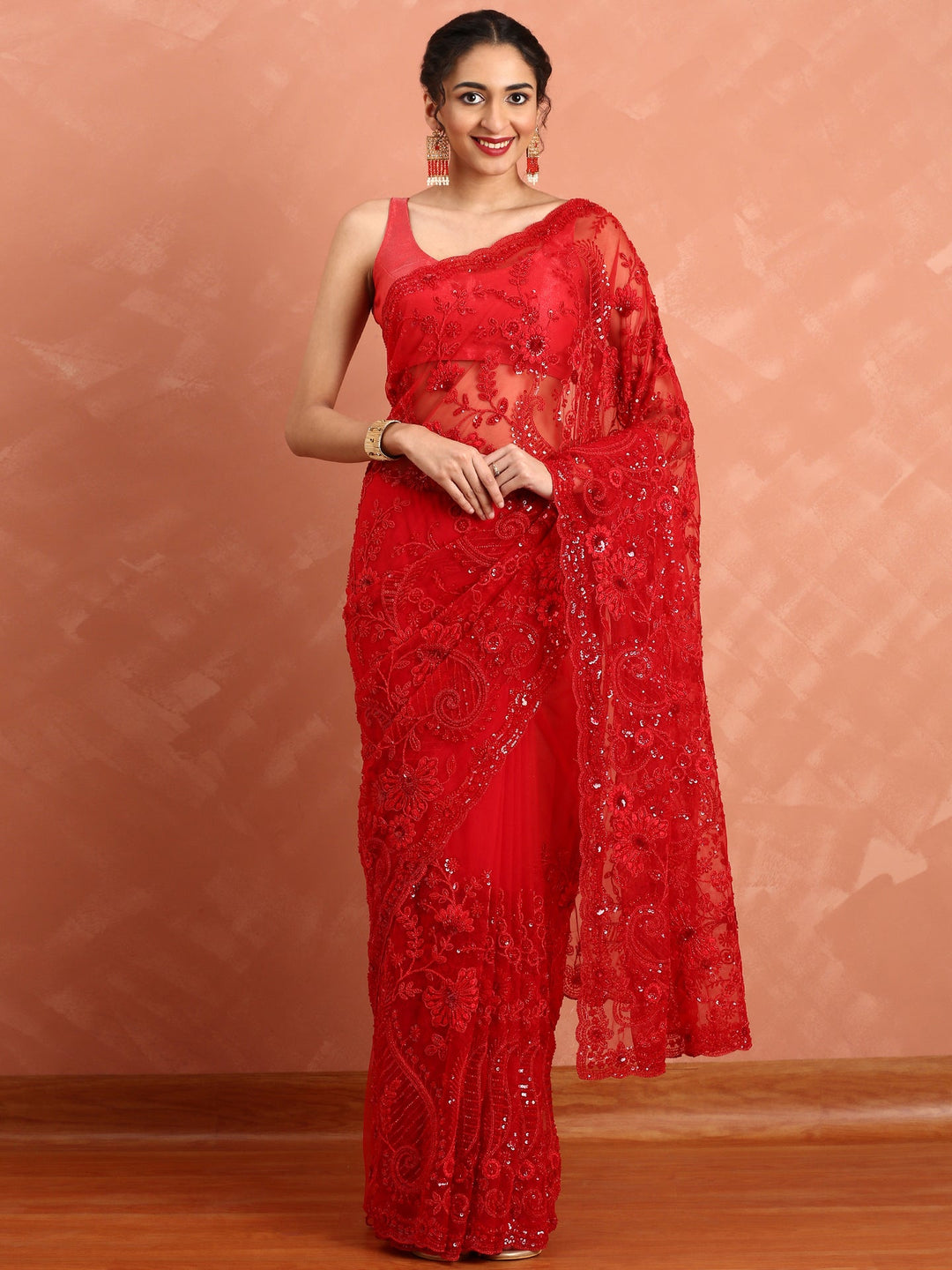 Neerus Red net hand embroidered saree with pearl sequins - front view