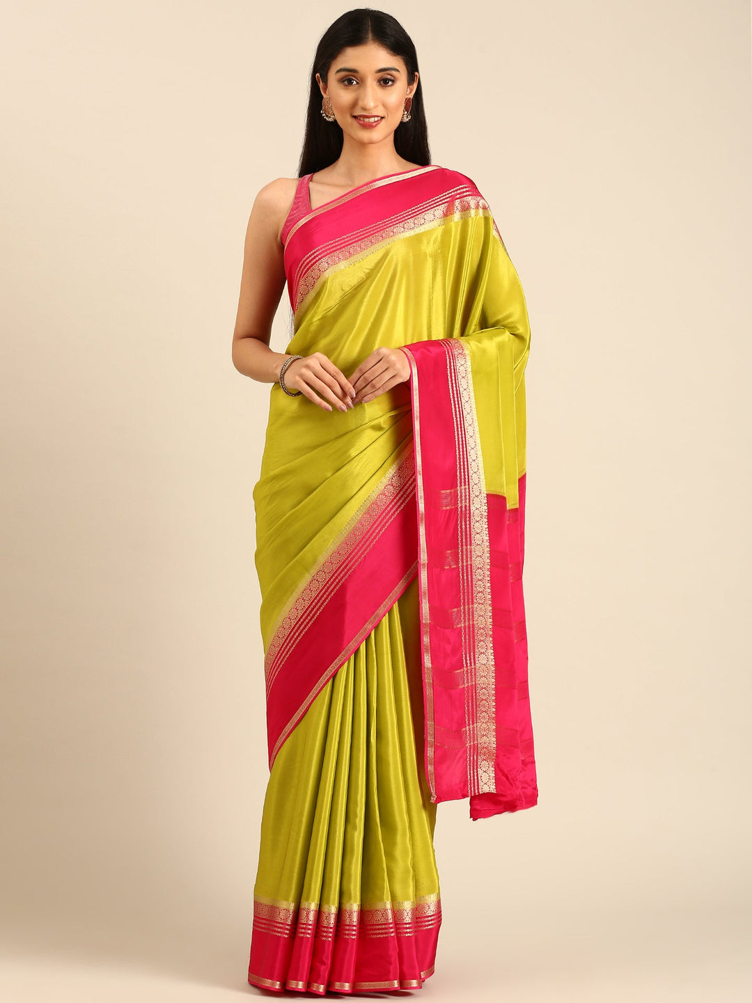 Neerus Green silk woven saree with contrast border and pallu - front view