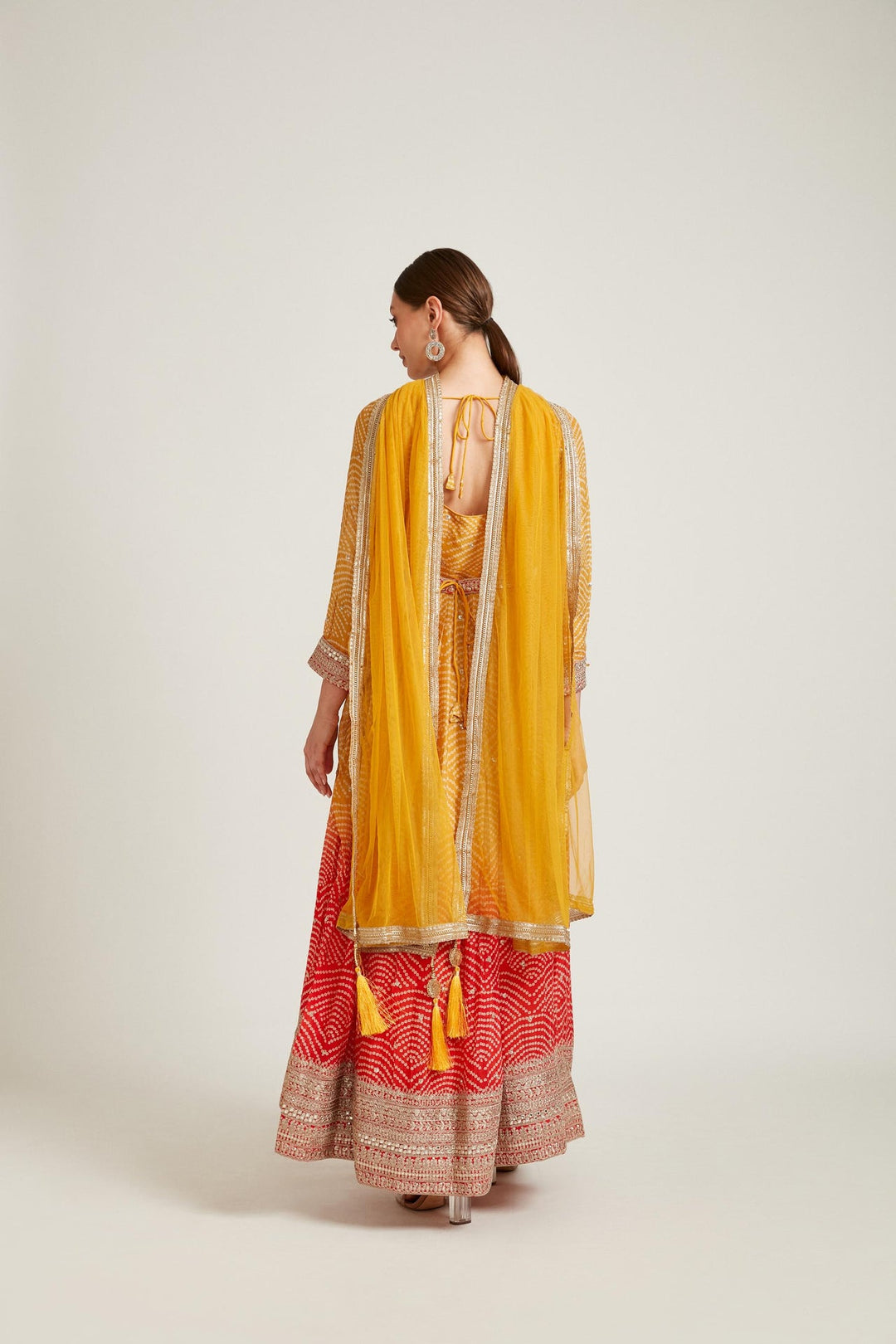 Neerus Yellow georgette maxi gown - side view