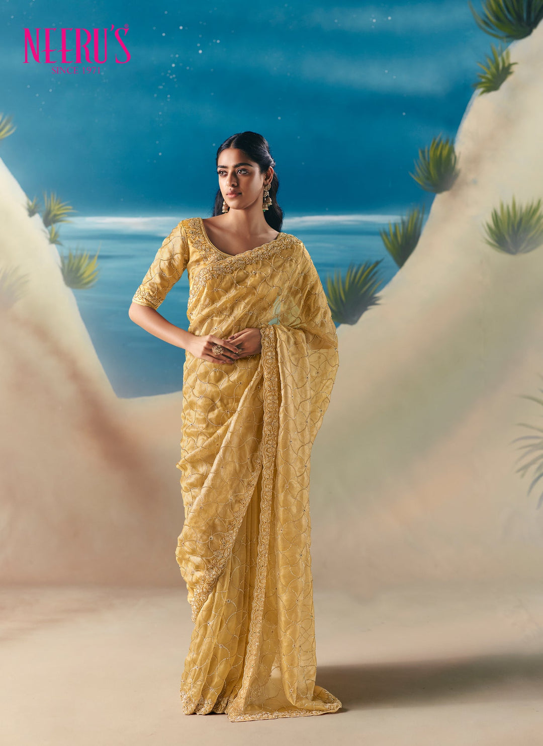 Neerus Yellow tissue hand embroidered saree with floral stone work - front view