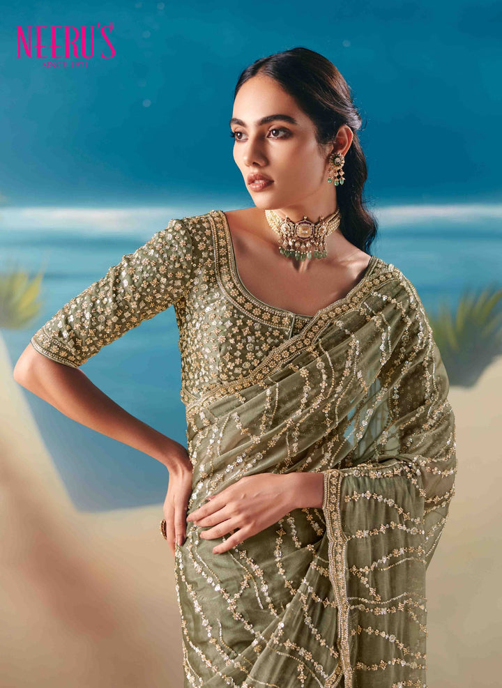 Neerus Green tissue hand embroidered saree - back view