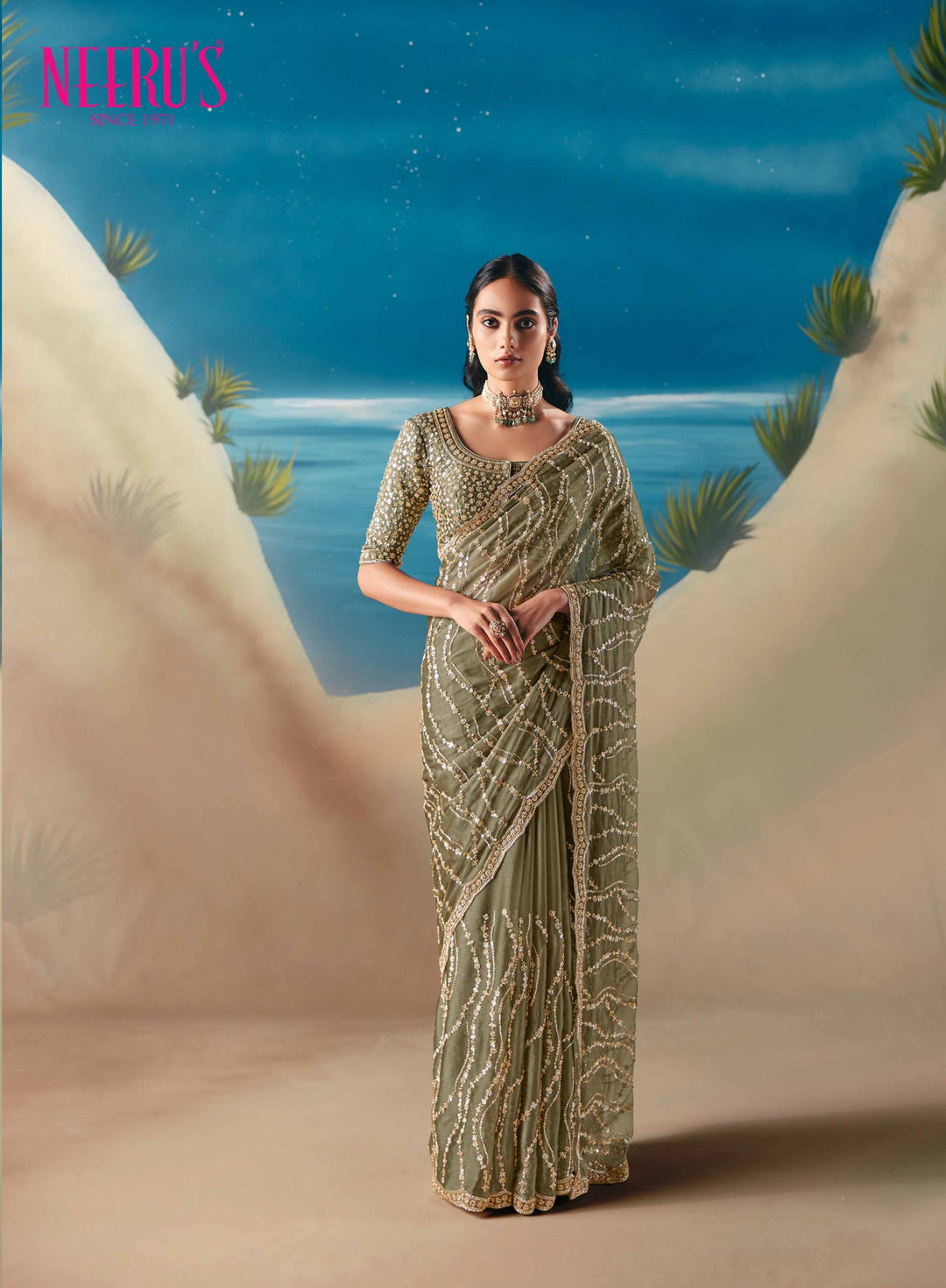 Neerus Green tissue hand embroidered saree - front view