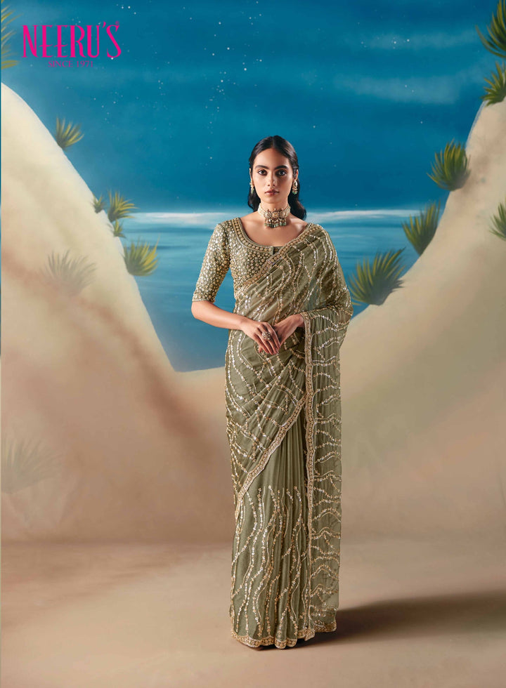 Neerus Green tissue hand embroidered saree - front view