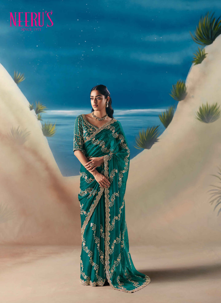 Neerus Green tissue hand embroidered saree - front view