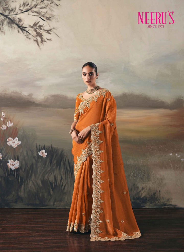 Neerus Orange tissue embellished saree - front view
